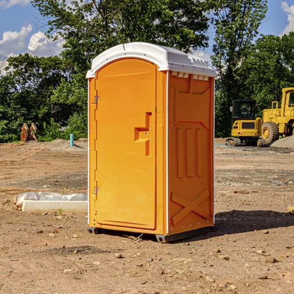 how often are the portable restrooms cleaned and serviced during a rental period in Coon Rapids